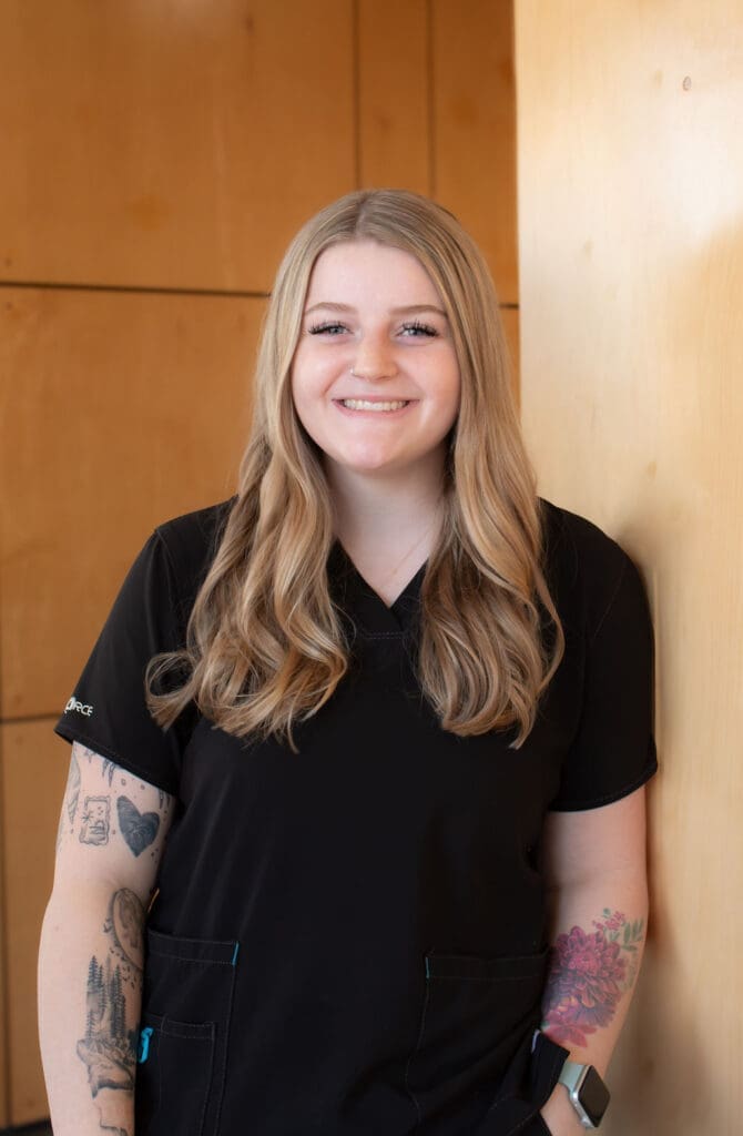 a woman smiling at camera